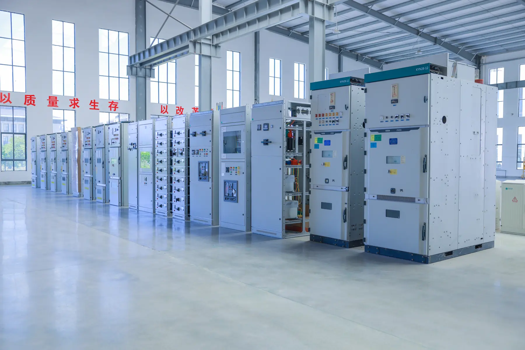 Switchgear cabinets assembled in a lineup inside the Minglang factory
